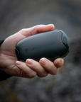 Lifesystems Dual-Palm Rechargeable Hand Warmers held in one hand