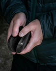 Lifesystems Dual-Palm Rechargeable Hand Warmers both in two hands