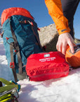 Lifesystems Mountain First Aid Kit on the snow