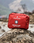 Lifesystems Mountain First Aid Kit on a rock