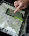 Trekmates Dry Map Case, Whistle and Compass Set being used
