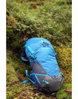 Vango Apex 25 Rucksack (Crystal Blue) on the grass