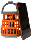 Vango Midge 100 Camping Lantern next to phone