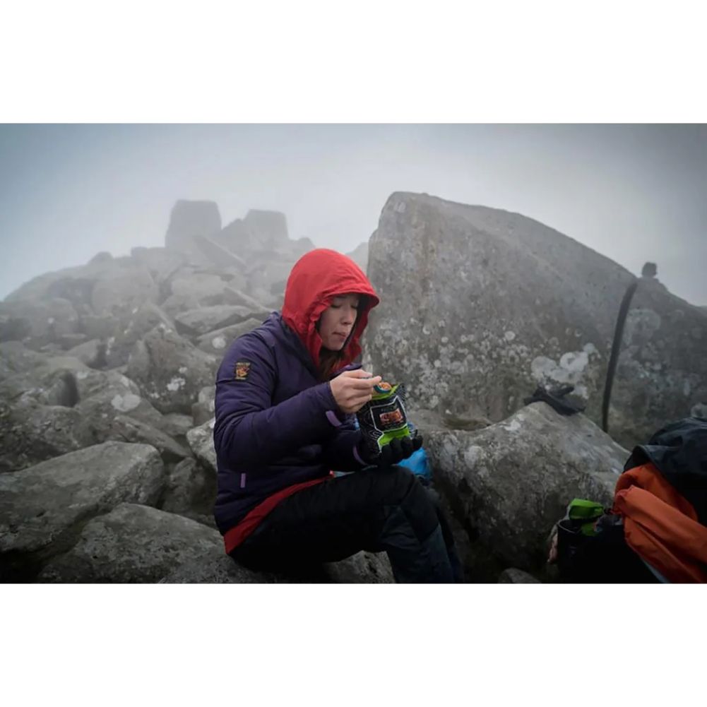 Wayfayrer Chilli Con Carne & Rice - Outdoor Camping Ready to Eat Meal Pouch eating on a hill