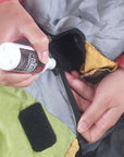 Gear Aid (By McNett) Zip Cleaner and Lubricant (60ml) applying