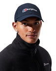 Berghaus Logo Recognition Cap (Dark Blue) model looking at us