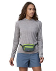 Patagonia Ultralight Black Hole Mini Hip Pack 1L (Nouveau Green) model wearing