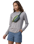 Patagonia Ultralight Black Hole Mini Hip Pack 1L (Nouveau Green) over the shoulder
