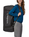 Patagonia Black Hole Duffel Bag 100L (Black) women carrying