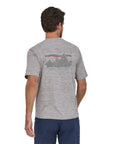 Patagonia Men's Capilene Cool Daily Graphic Shirt ('73 Skyline: Feather Grey) model back