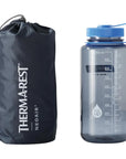 Thermarest NeoAir XLite NXT Sleeping Mat - Regular (Lemon Curry) size next to bottle