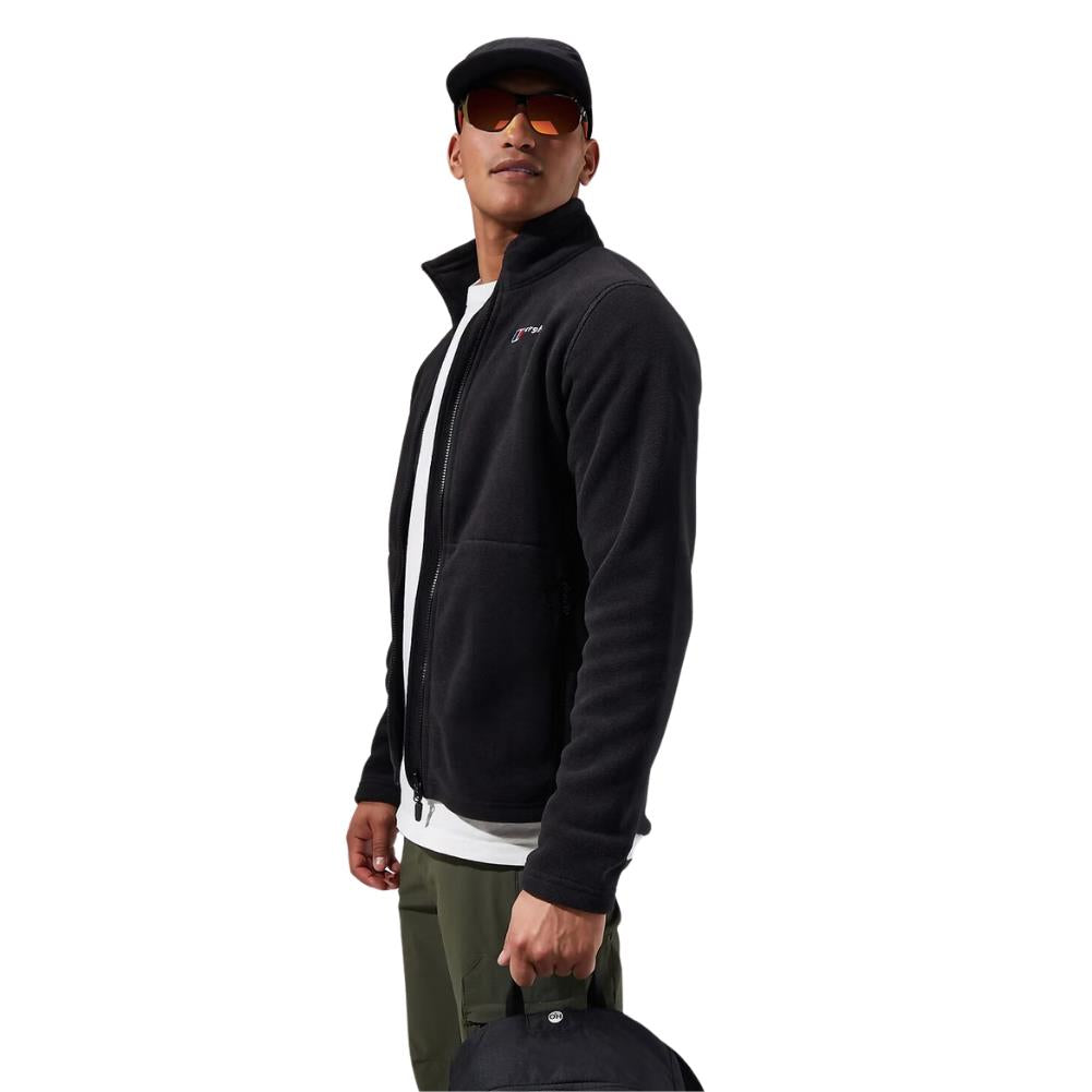 Berghaus Men's Prism Polartec Interactive Fleece Jacket (Black) side with glasses on