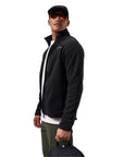 Berghaus Men's Prism Polartec Interactive Fleece Jacket (Black) side with glasses on