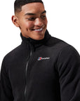 Berghaus Men's Prism Polartec Interactive Fleece Jacket (Black) model smiling