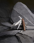 Victorinox RangerWood 55 Walnut Swiss Army Knife (Blister Pack) 'ZZ' on rocks