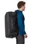Patagonia Black Hole Duffel Bag 70L (Black) on model back