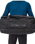 Patagonia Black Hole Duffel Bag 70L (Black) holding seither side