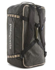 Patagonia Black Hole Duffel Bag 70L (Pine Needle Green) standing up