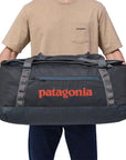 Patagonia Black Hole Duffel Bag 70L (Smoulder Blue) holding
