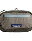 Patagonia Ultralight Black Hole Mini Hip Pack 1L (Pine Needle Green) front