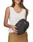 Patagonia Black Hole Cube 6L (Smolder Blue) holding