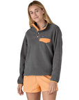 Patagonia Women's Lightweight Synchilla Snap-T Fleece Pullover (Nickel w/Vivid Apricot) model smiling