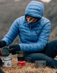Montane Women's Anti-Freeze Hooded Down Jacket (Cornflower) being used