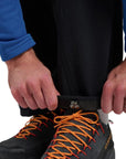 Montane Men's Terra XT Pants - Regular (Black) pulling up leg