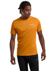 Montane Men's Dart T-Shirt (Nagami Orange) model looking away