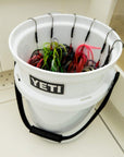 Yeti Loadout 5 Gallon Bucket (White) view being used