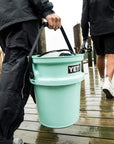 Yeti Loadout 5 Gallon Bucket (Seafoam) walking