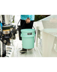 Yeti Loadout 5 Gallon Bucket (Seafoam) in a boat