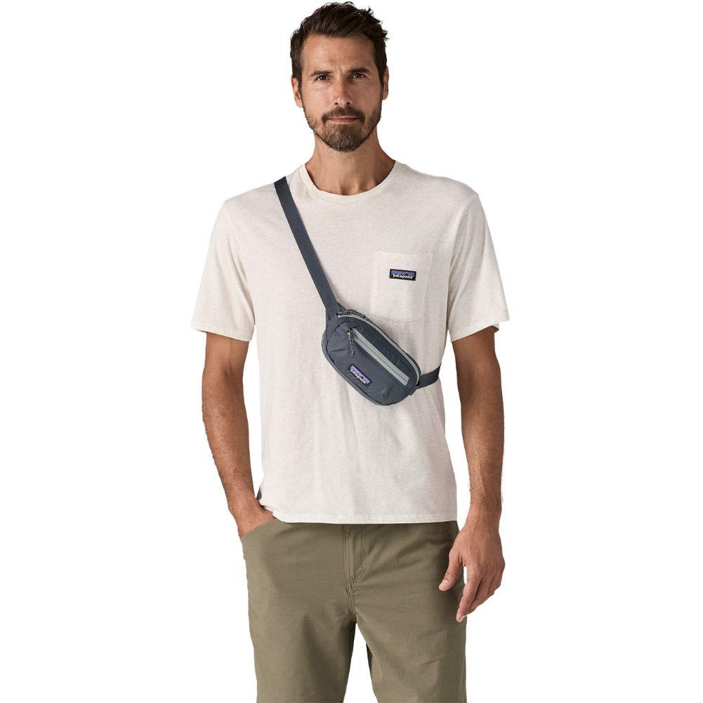 Patagonia Terravia 1L Mini Hip Pack (Smolder Blue) over shoulder