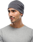 Buff Merino Lightweight Beanie (Solid Grey) person