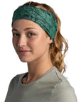 Buff CoolNet UV Neckwear (Ark Ever Green) on forehead