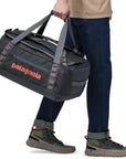 Patagonia Black Hole Duffel 40L (Matte Smolder Blue) carrying
