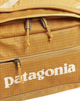 Patagonia Black Hole 55L Duffel Bag (Pufferfish Gold) logo