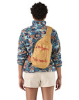 Patagonia Atom Sling Bag 8L (Mountain Breeze: Buttercup Yellow) on the back