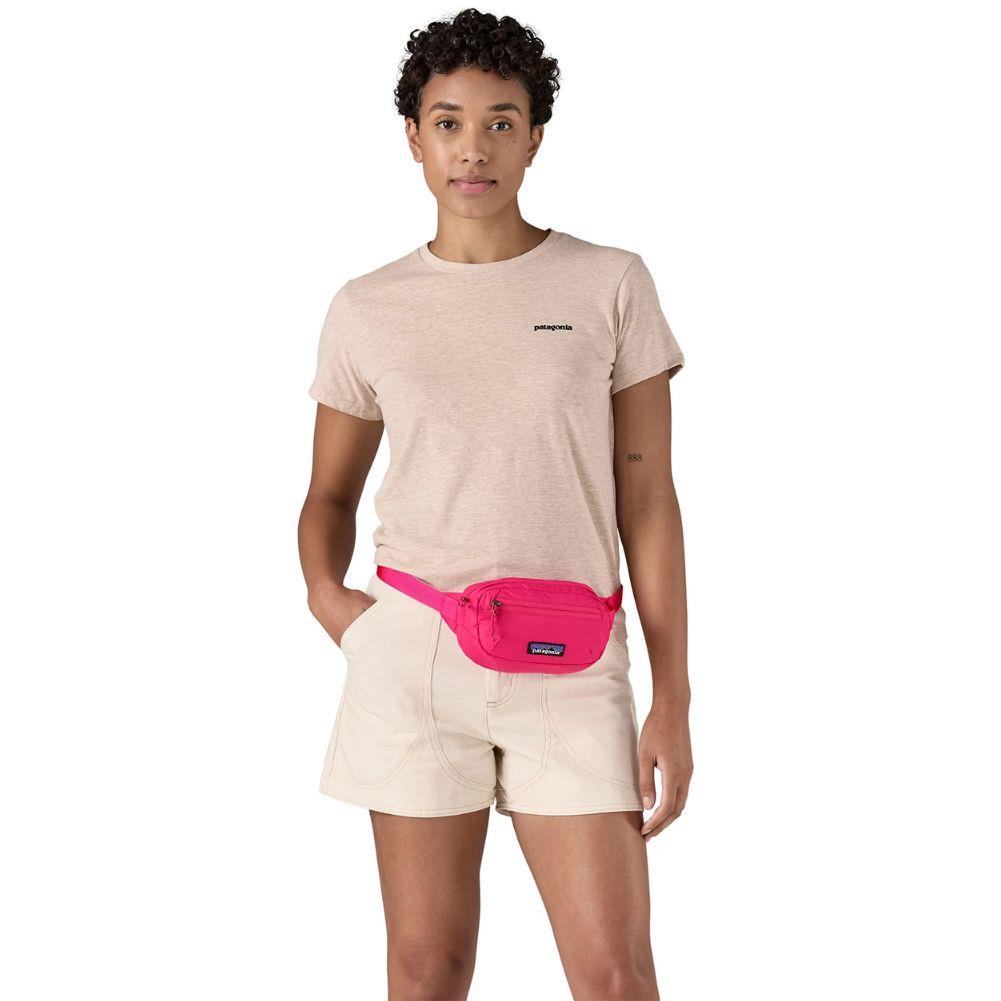 Patagonia Terravia 1L Mini Hip Pack (Luminous Pink) on the hip