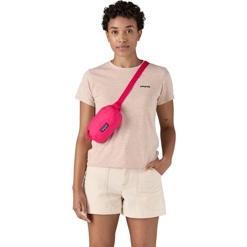 Patagonia Terravia 1L Mini Hip Pack (Luminous Pink) over shoulder