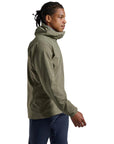 Montane Men's Tenacity Hooded Softshell Jacket (Caper) walking right