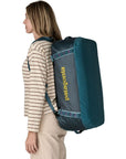 Patagonia Black Hole 55L Duffel Bag (Tidal Teal w/Luminous Pink) backage