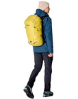 Rab Ascendor 35L Mountain Pack (Dark Pollen) walking away