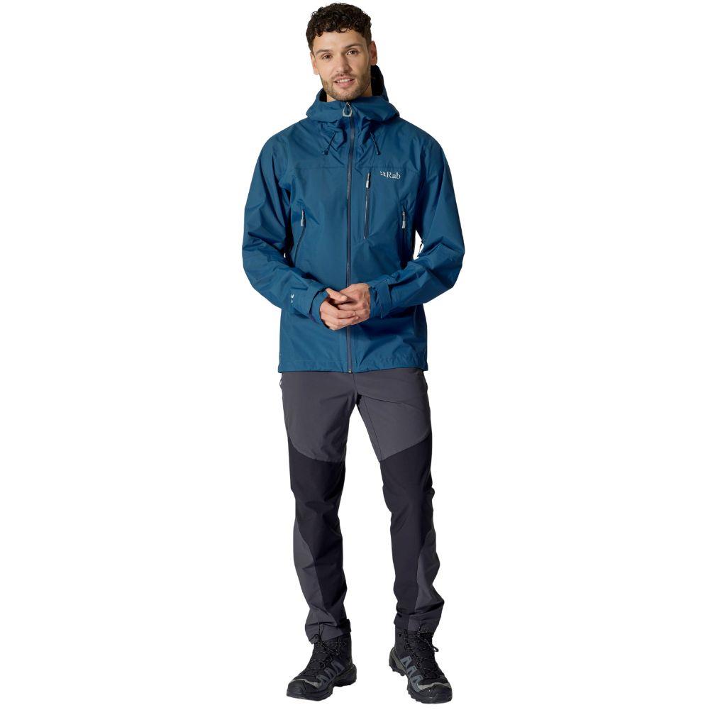 Rab Men's Downpour Mountain Waterproof Jacket (Tempest Blue) standing