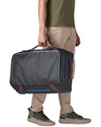 Patagonia Black Hole Wheeled Duffel 40L (Smolder Blue w/Amanita Red) holding