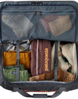 Patagonia Black Hole Wheeled Duffel 70L (Smolder Blue w/Amanita Red) inside