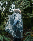 Coghlan's Emergency Poncho (Clear) woods