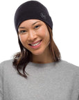Buff Merino Midweight Beanie Hat (Solid Black) woman front
