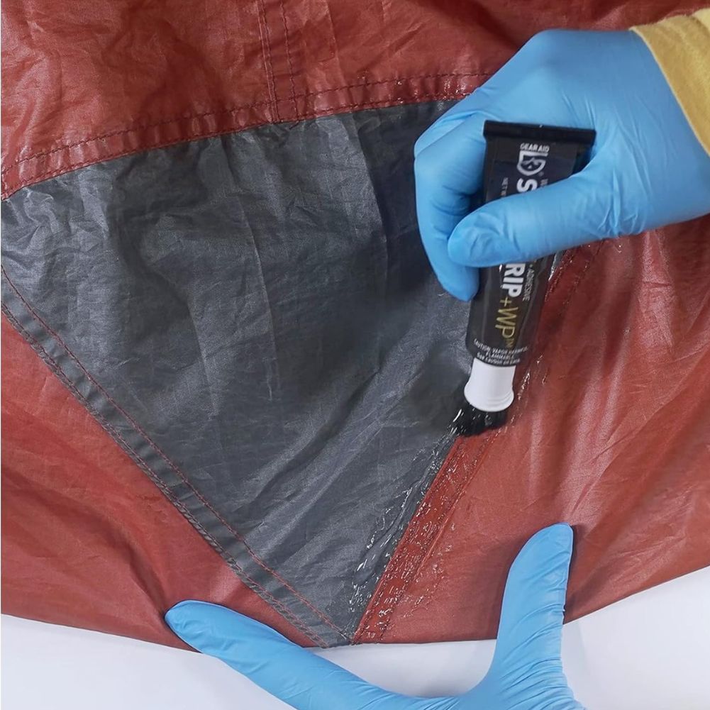 Gear Aid (By McNett) Seam Grip + WP Sealant + Adhesive (28g Tube with Brush Applicator) applying