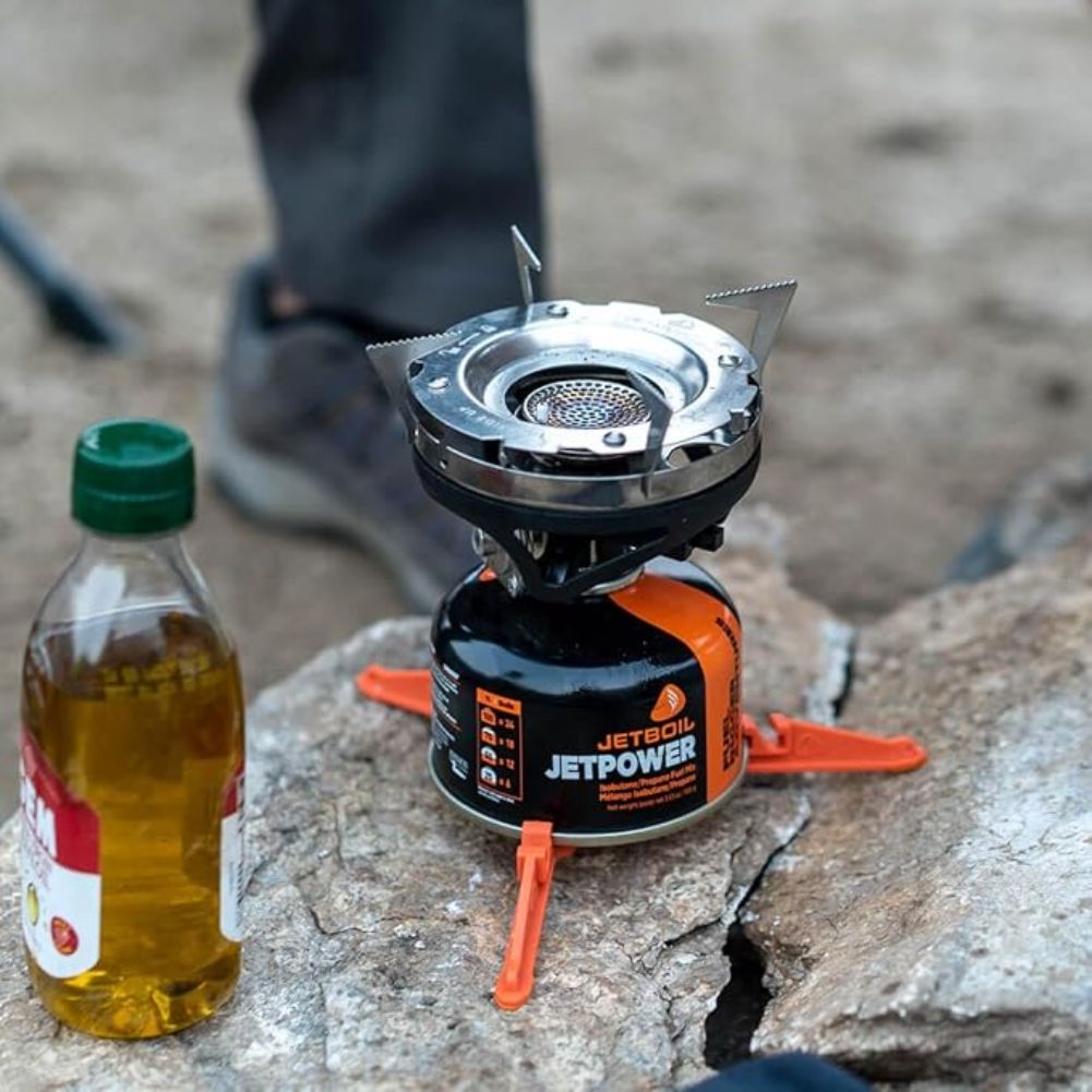 Jetboil Fuel Can Stabilizer on rocks and used